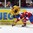 MALMO, SWEDEN - DECEMBER 29: Sweden's Lukas Bengtsson #20 makes a pass while Norway's Mattias Norstebo #2 defends during preliminary round action at the 2014 IIHF World Junior Championship. (Photo by Andre Ringuette/HHOF-IIHF Images)